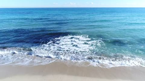 mixkit-waves-coming-to-the-beach-5016-hd-ready